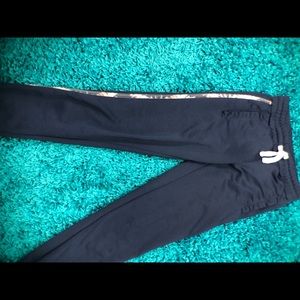 Navy joggers with colorful side detail and pockets